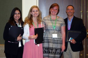 Winners of Poster Presentation awards, morning session (left to right): Carolina Batista, Adrienne Borrie, Emily Rodrigues (accepting on behalf of Alexandra Hauser-Kawaguchi, shown separately), with Dr. Trevor Shepherd.