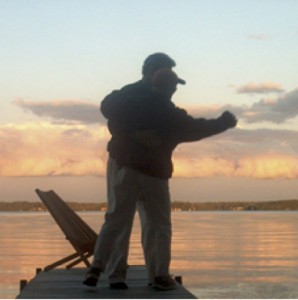 Marc and Kim dancing on the dock at the cottage before she succumbed to the breast cancer.